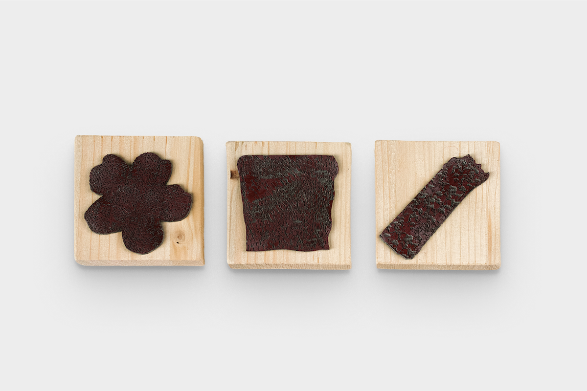 Wooden stamps based on shapes found in the visual identity