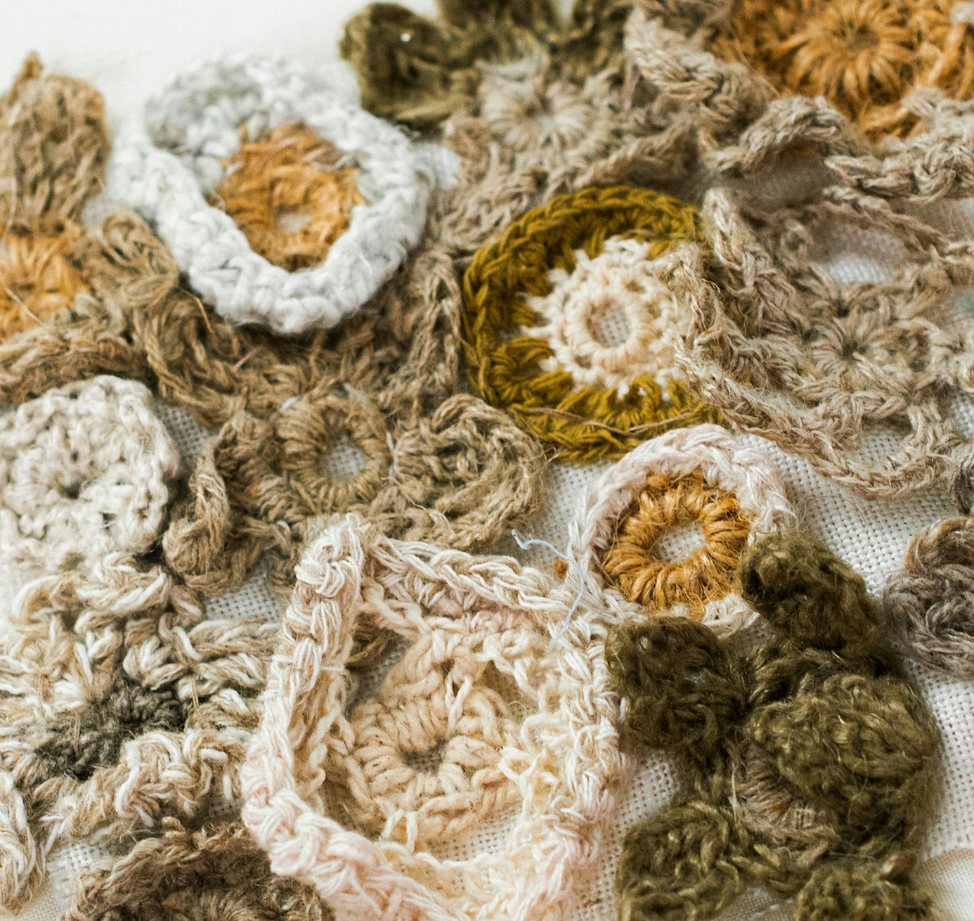 Photography of crocheted linen flowers.