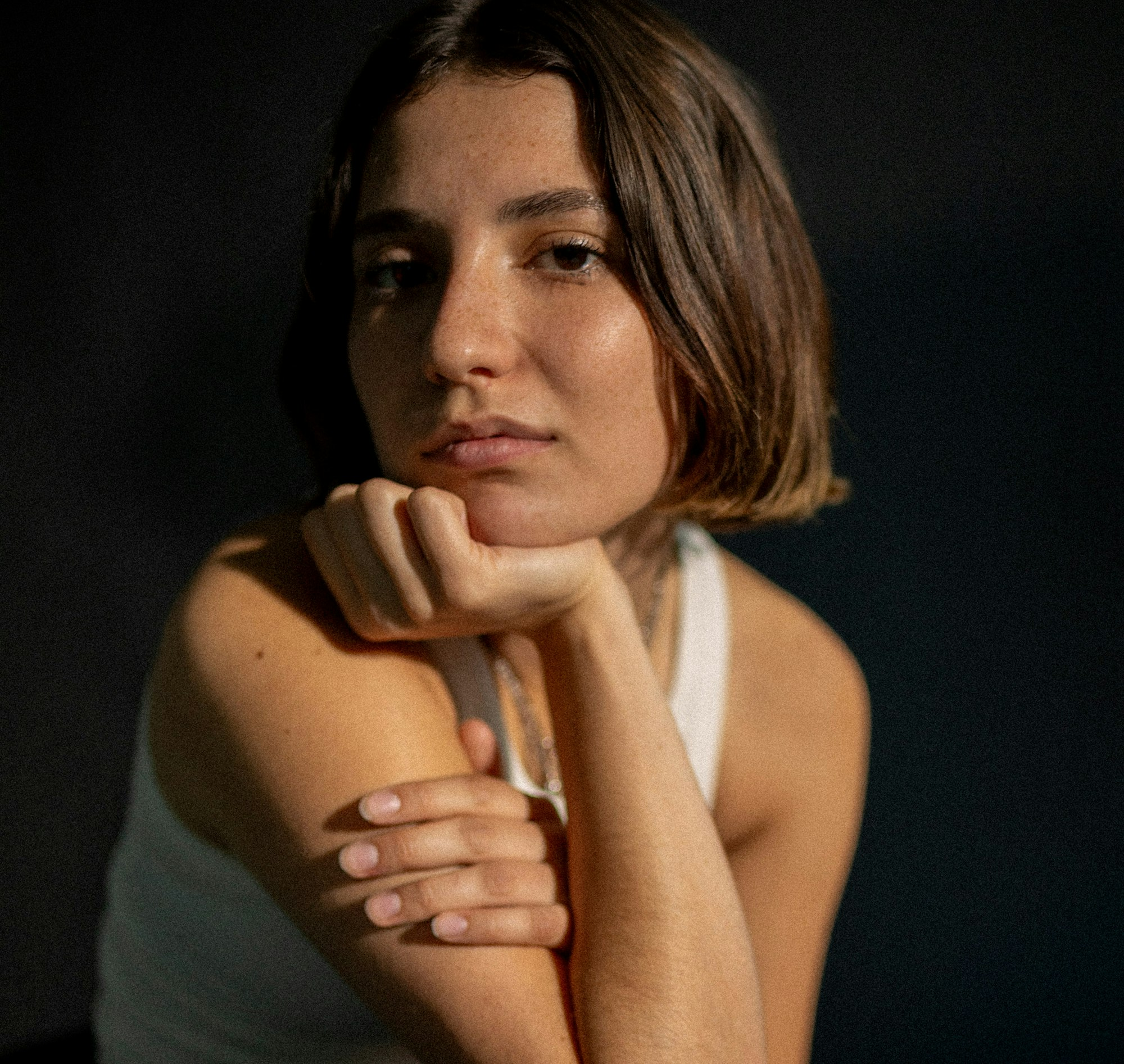 A portrait photography of a woman featured in the book.