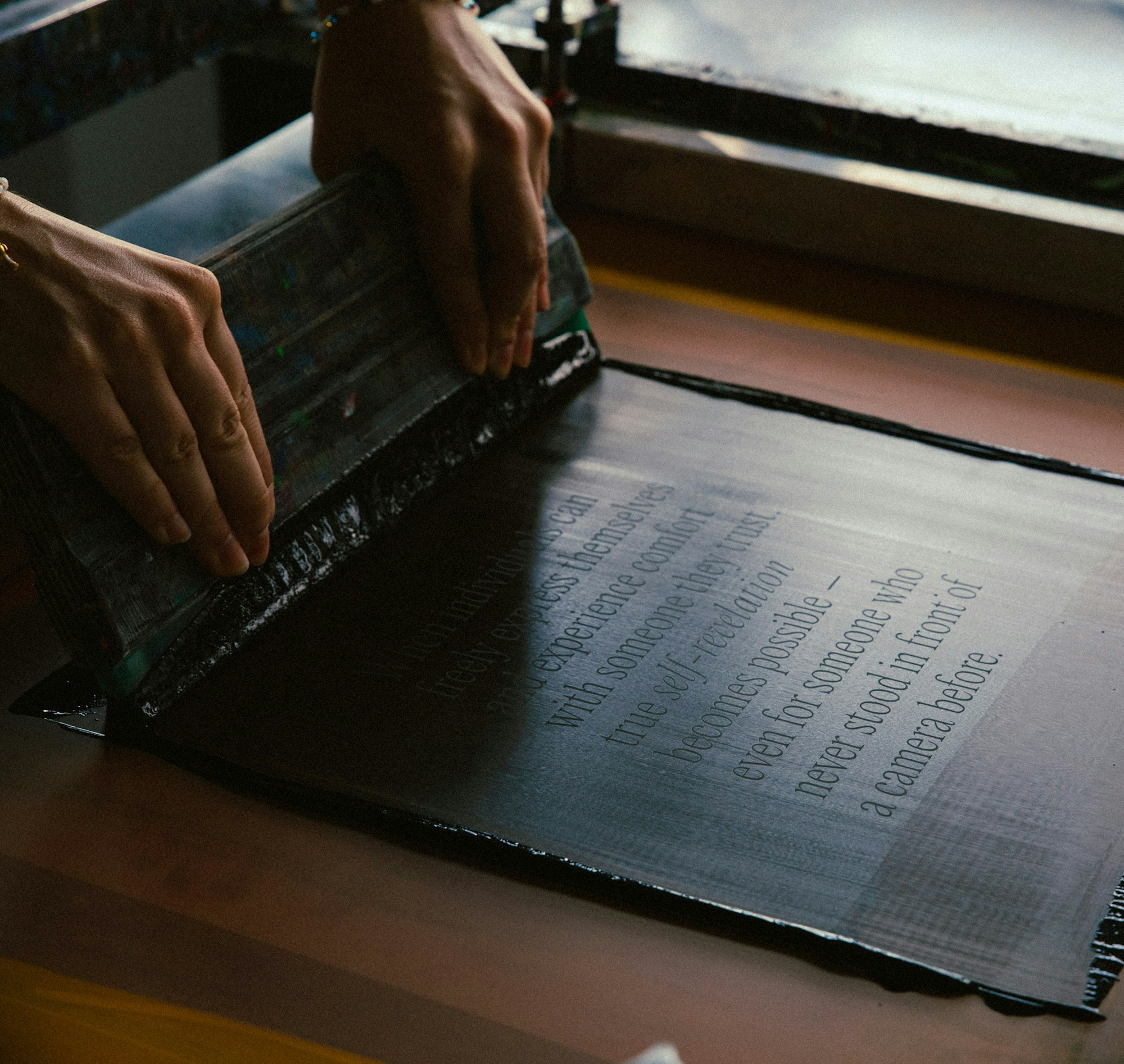Photography of screenprinting process.
